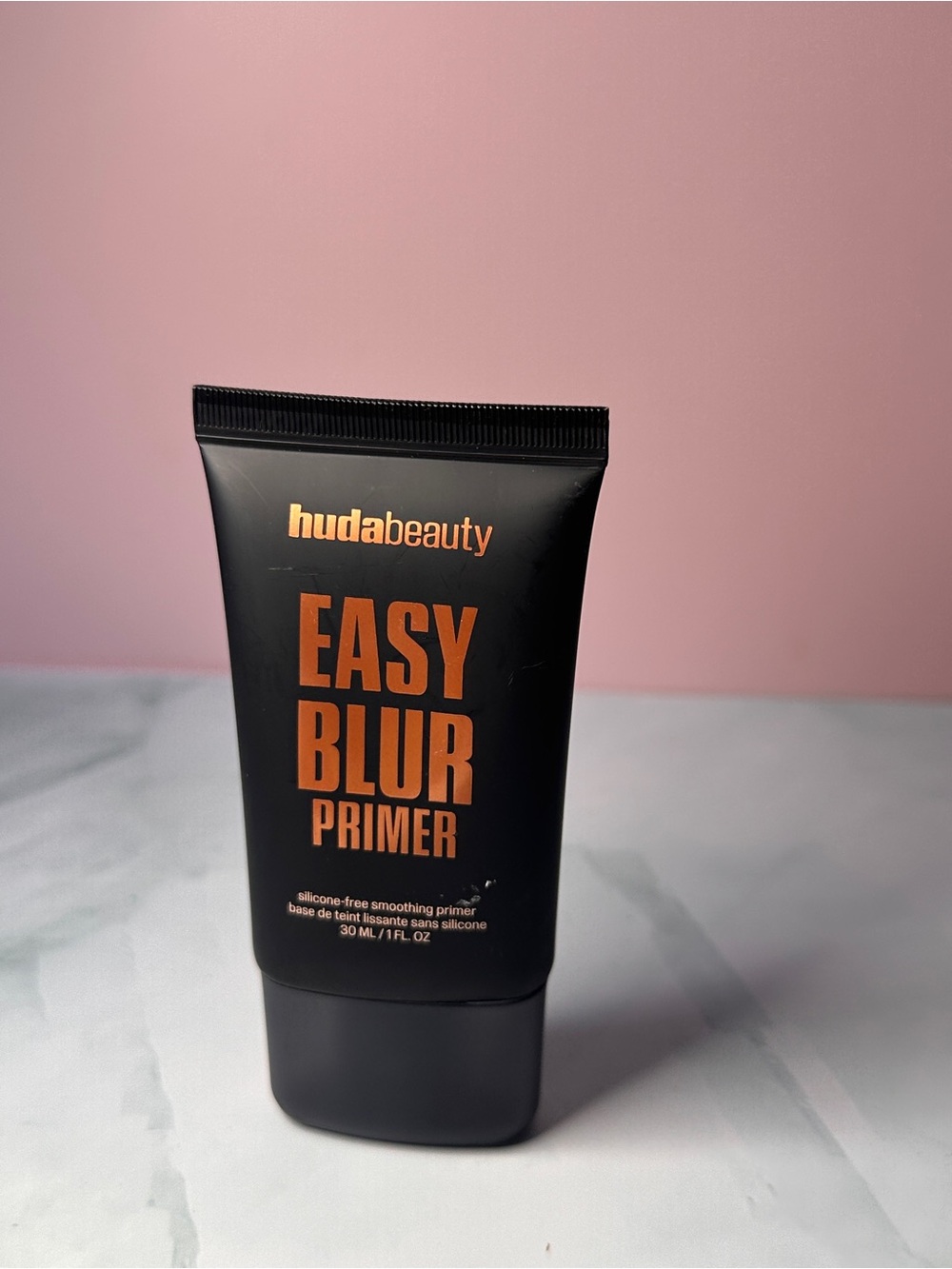 HUDA BEAUTY Easy Blur Primer - Black with Orange Text